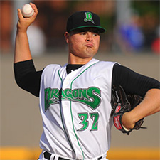 Dragons fight off rain, but cant hold off Whitecaps in opener