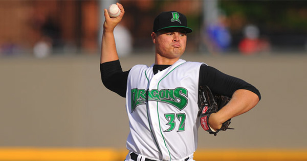 Dragons fight off rain, but cant hold off Whitecaps in opener
