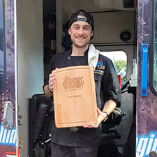 Drew Peterson of Rolling Indulgence wins sauce at Wing Fest 2022